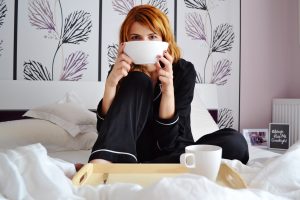 woman with mug preventing flu